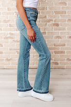 Load image into Gallery viewer, Isla Mid Rise Distressed Released Hem Bootcut Jeans