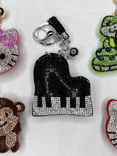 Load image into Gallery viewer, Rhinestone Puffy Keychain - HK, Snake, and Piano
