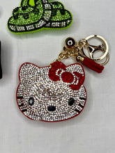 Load image into Gallery viewer, Rhinestone Puffy Keychain - HK, Snake, and Piano
